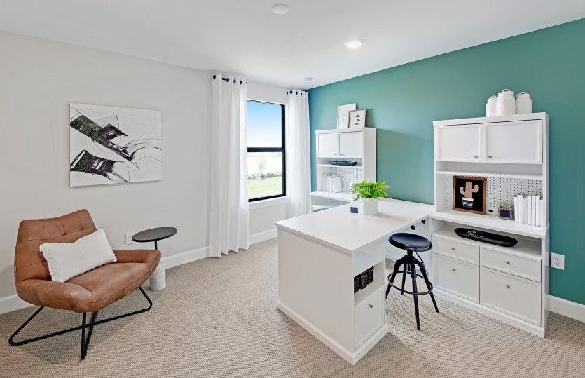 Fifth bedroom with large window located down stairs, perfect for a hobby room
