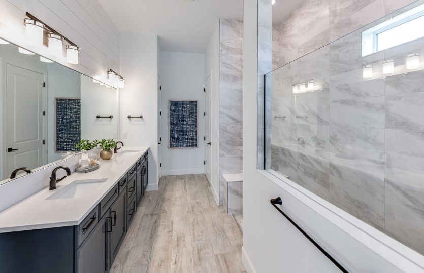 Walk-in shower in the owner's spa like bathroom