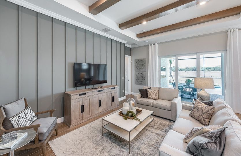 Spacious gathering room with sliding glass doors with lanai access