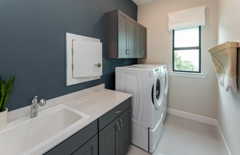 Laundry room with ample storage spaces