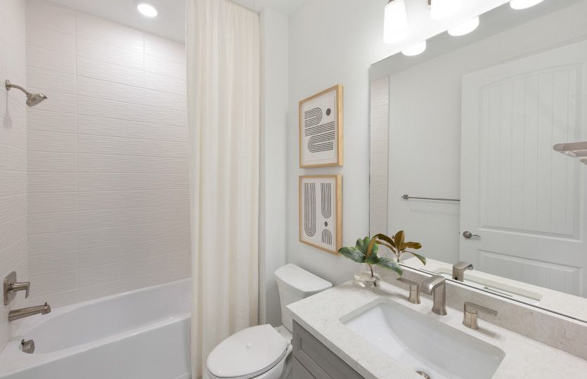 Secondary bathroom with tub and shower combination