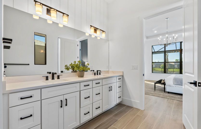 Owner's bathroom with dual sink vanity