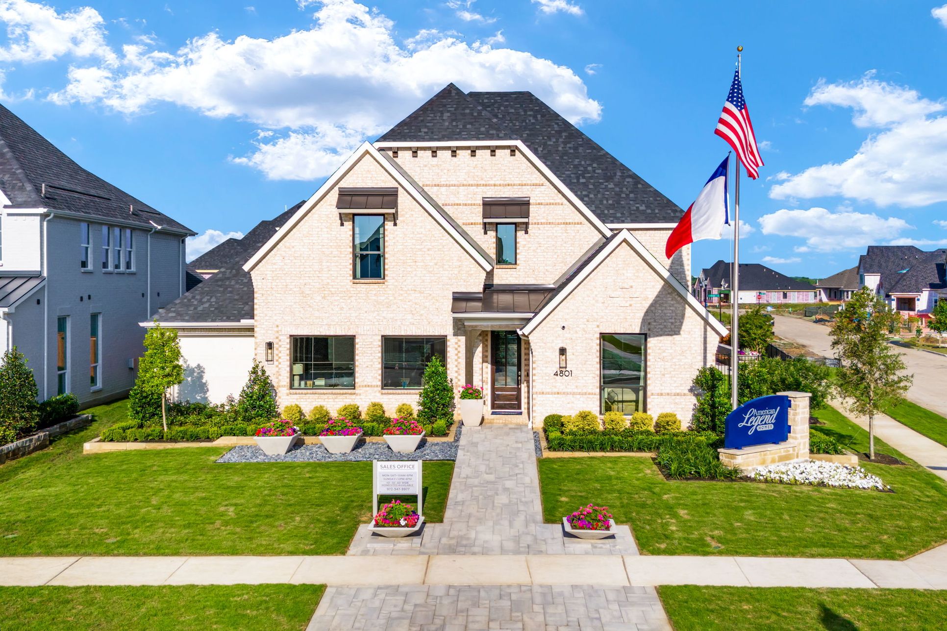 Front exterior of the American Legend Homes 50-foot model in Mosaic, Celina, Texas featuring ligh...:Mosaic Celina 50' Model Home Exterior – American Legend Homes