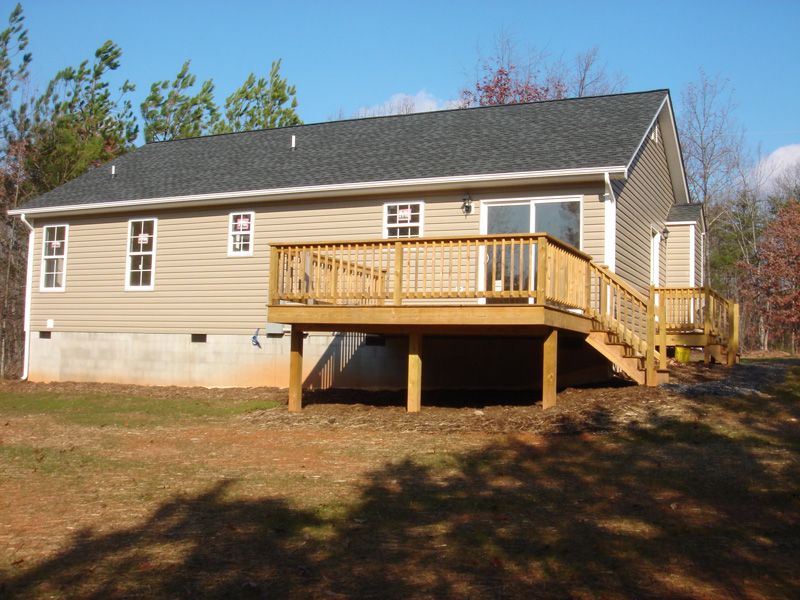 JT Homes,97701