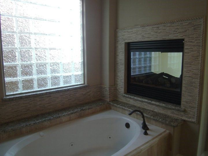 Windsor Custom Homes,77303