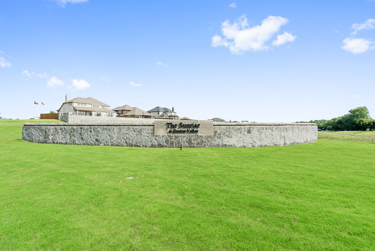 Sunrise at Garden Valley Sign
