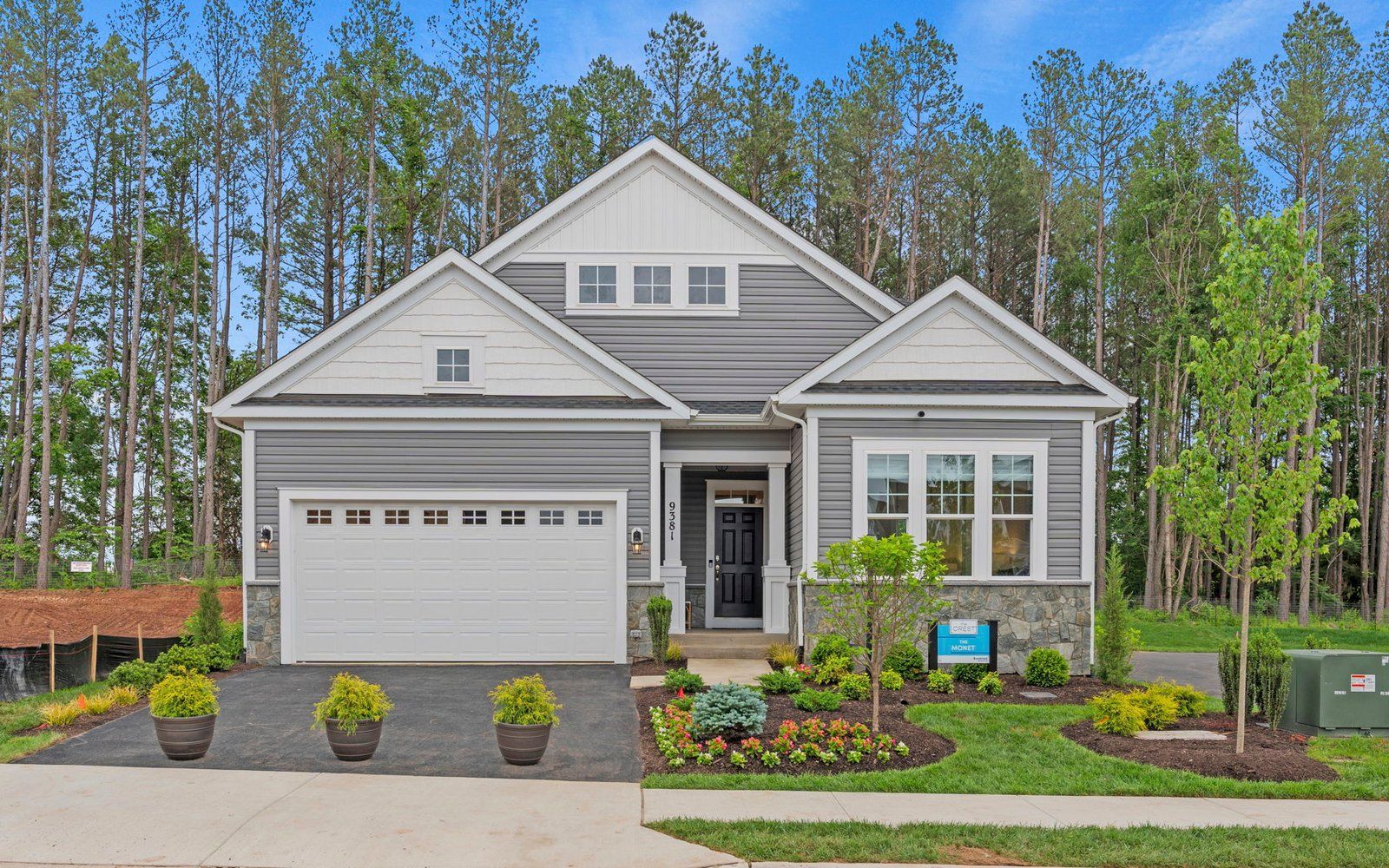 Exterior:A view of the front exterior of the Monet model at The Crest at Linton Hall.
