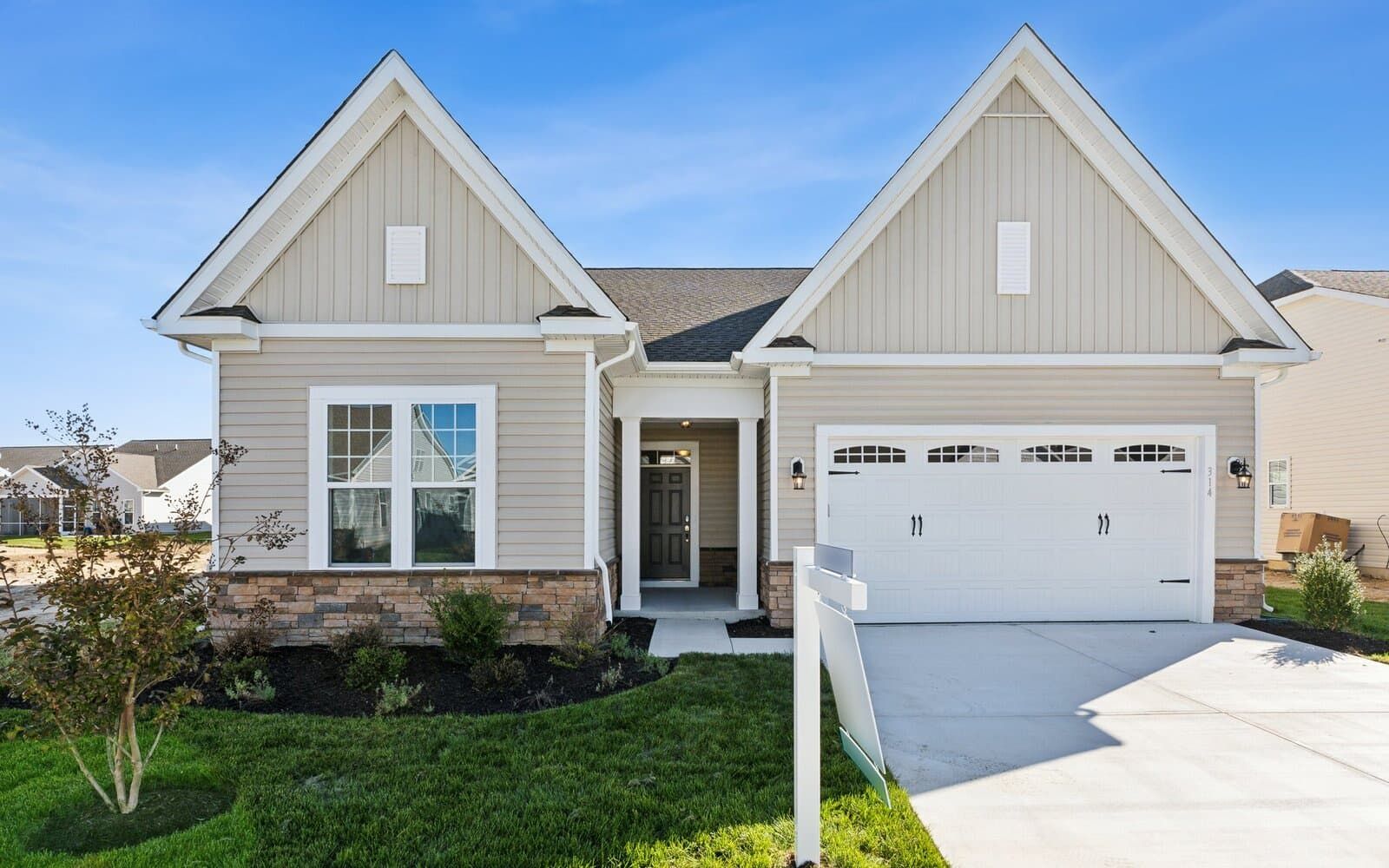 Exterior:The front exterior of the Monet on homesite 984 at Heritage Shores.