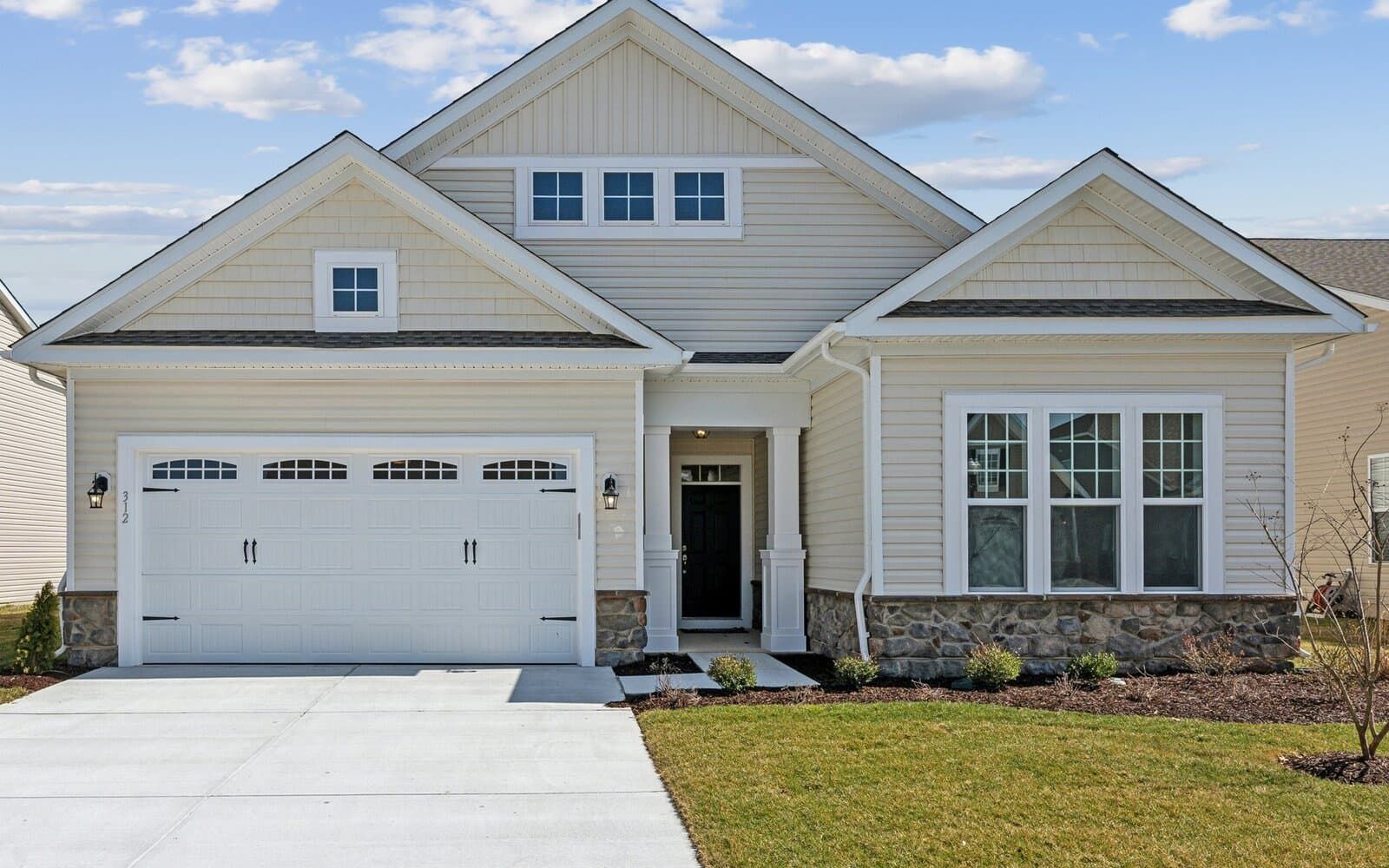 Exterior:The exterior of the Monet on homesite 983 at Heritage Shores by Brookfield Residential.