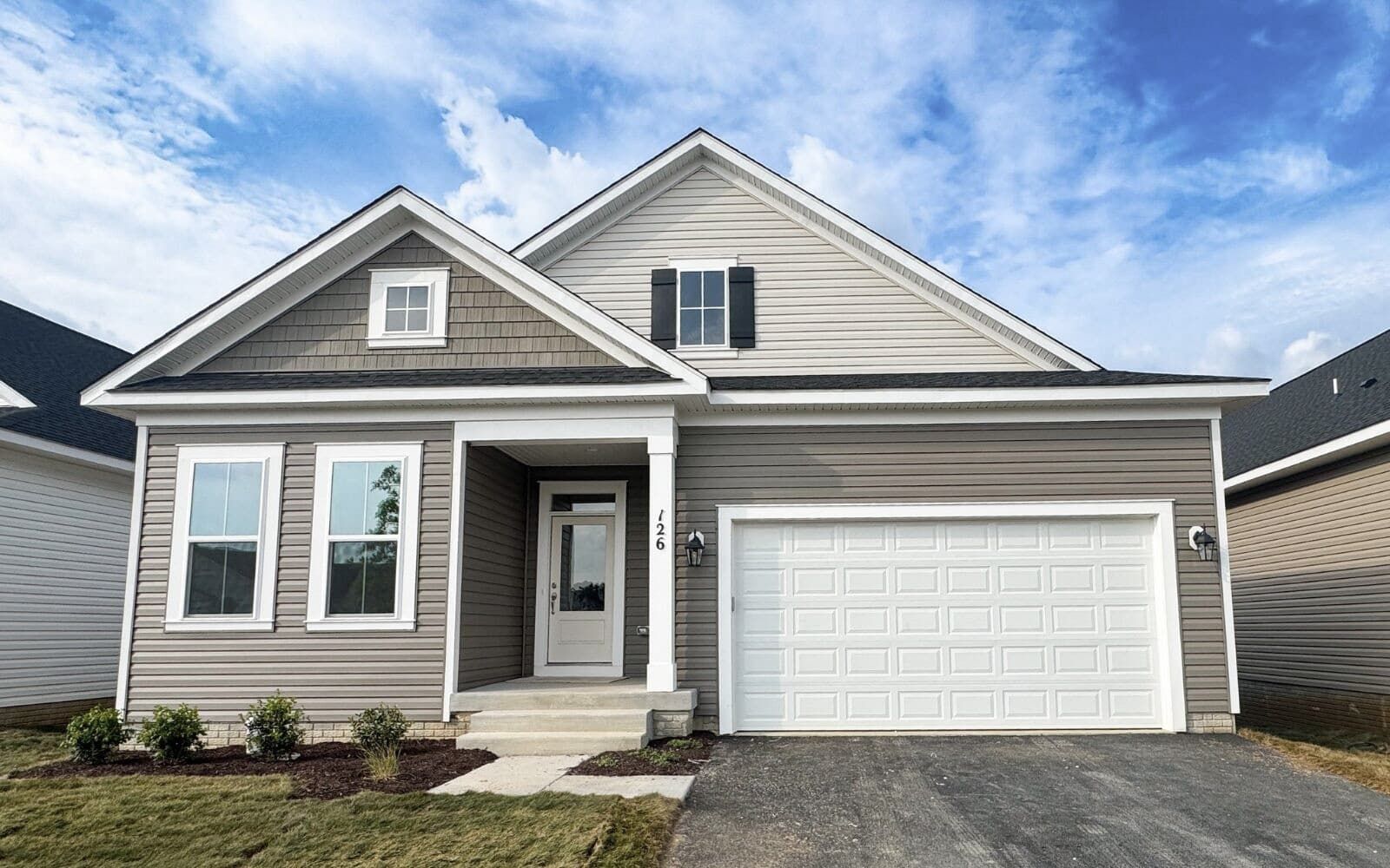 Exterior:The exterior of the Rockwell on homesite 1018 at Hiatt Pointe at Snowden Bridge by Brookfield Residential.