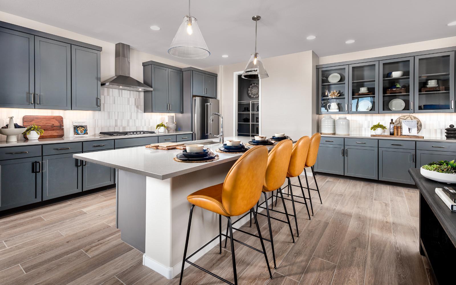 Kitchen:An image of the kitchen in the Solstice model home at Mariposa in Blossom Rock.
