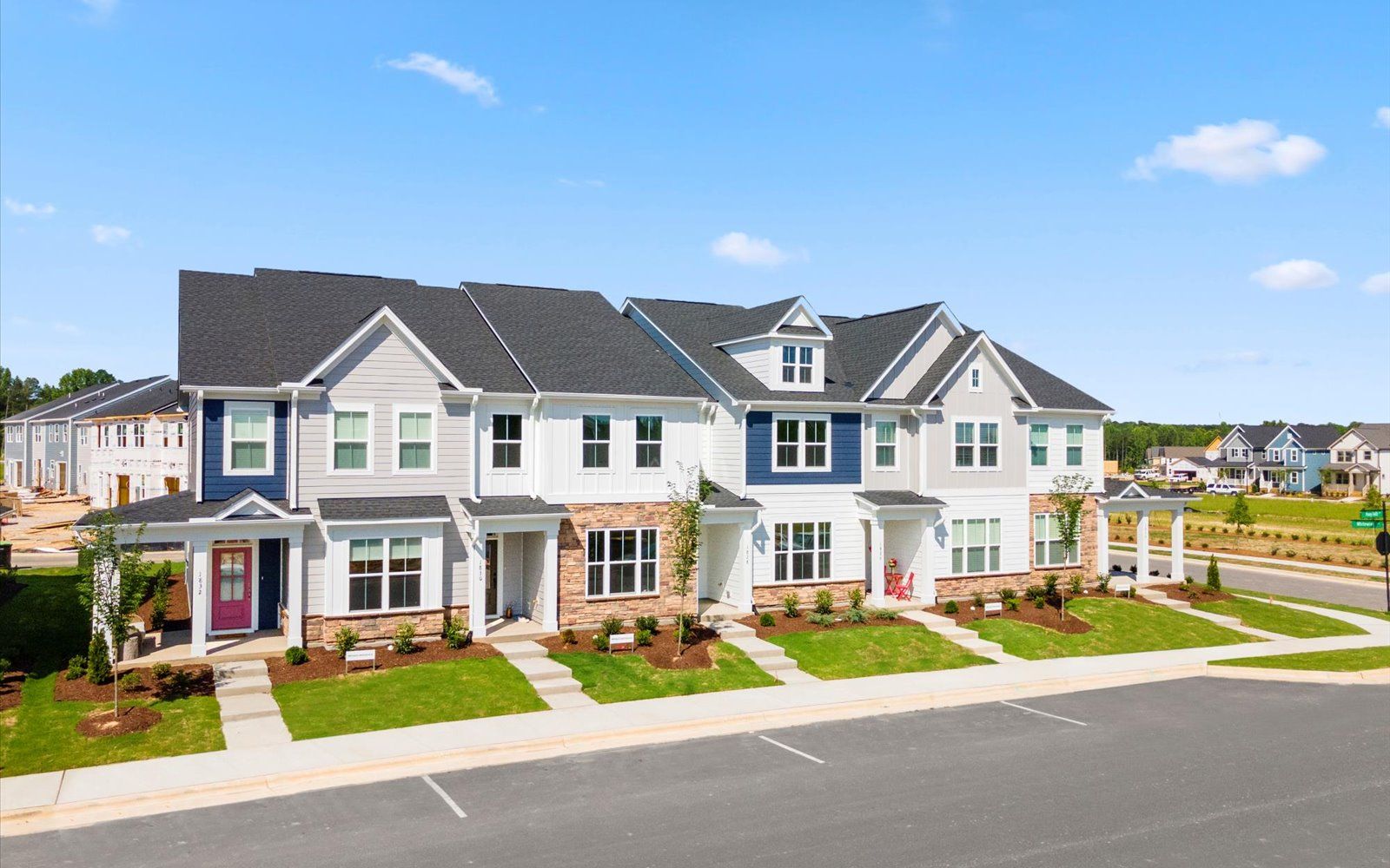 An exterior view of the townhomes by Brookfield Residential at Wendell Falls.