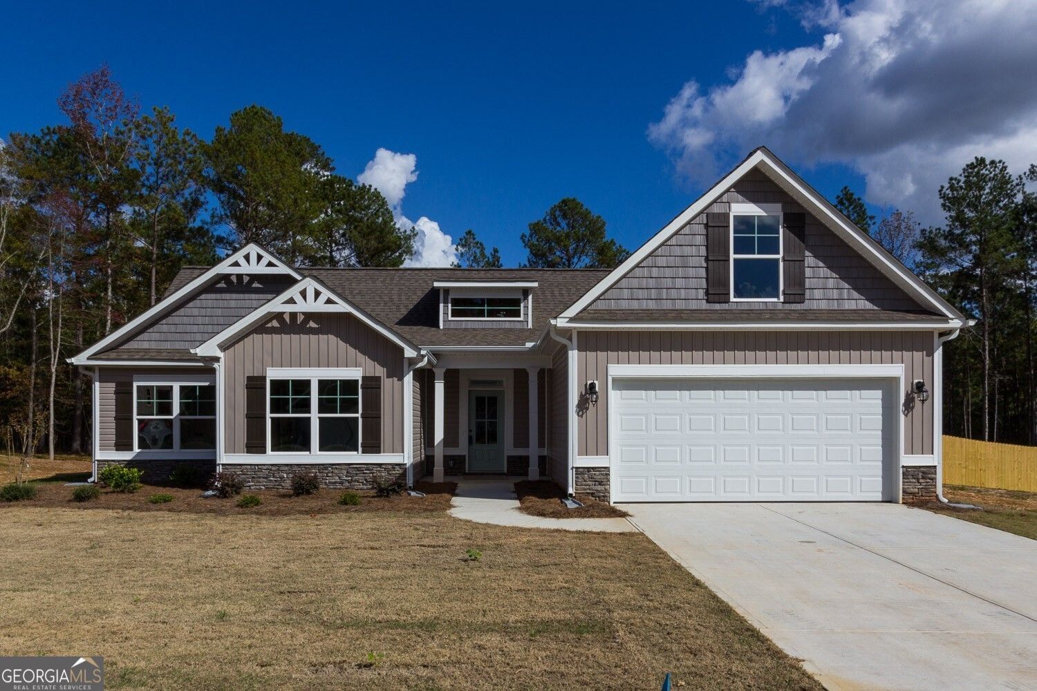 Savoy Park, 130 Eryn Terrace:Front Outside view, Double Car Garage, Front Door, Level Lot, Brick accents, wanes coat on front.  Low maintenance vinyl siding. Coach Lights, sprinkler system