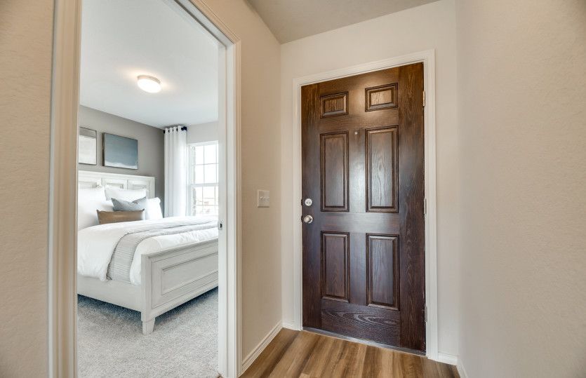 Exterior:Welcoming entryway with flexible living space *model representation