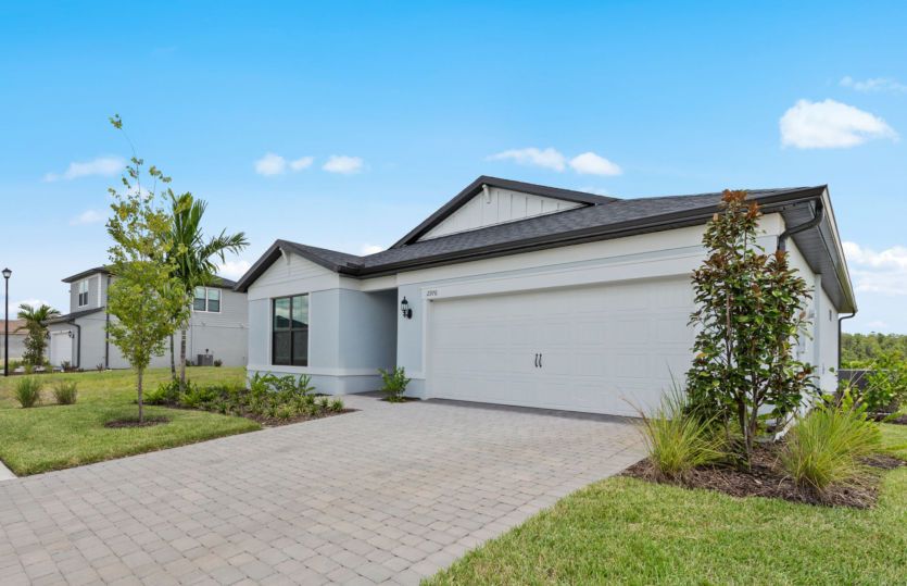 Exterior:Welcoming Crestmere Exterior with Impact Glass