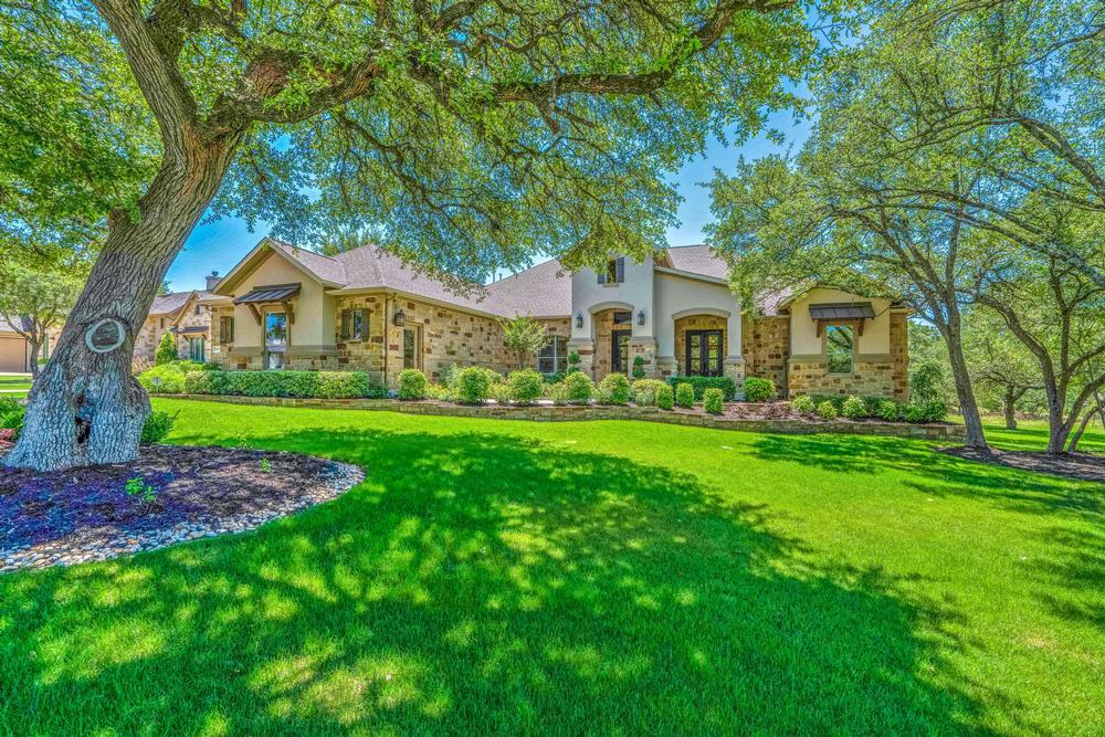 Exterior image of the Carolina model, at Reagan's Overlook acreage community in Leander, by Century 