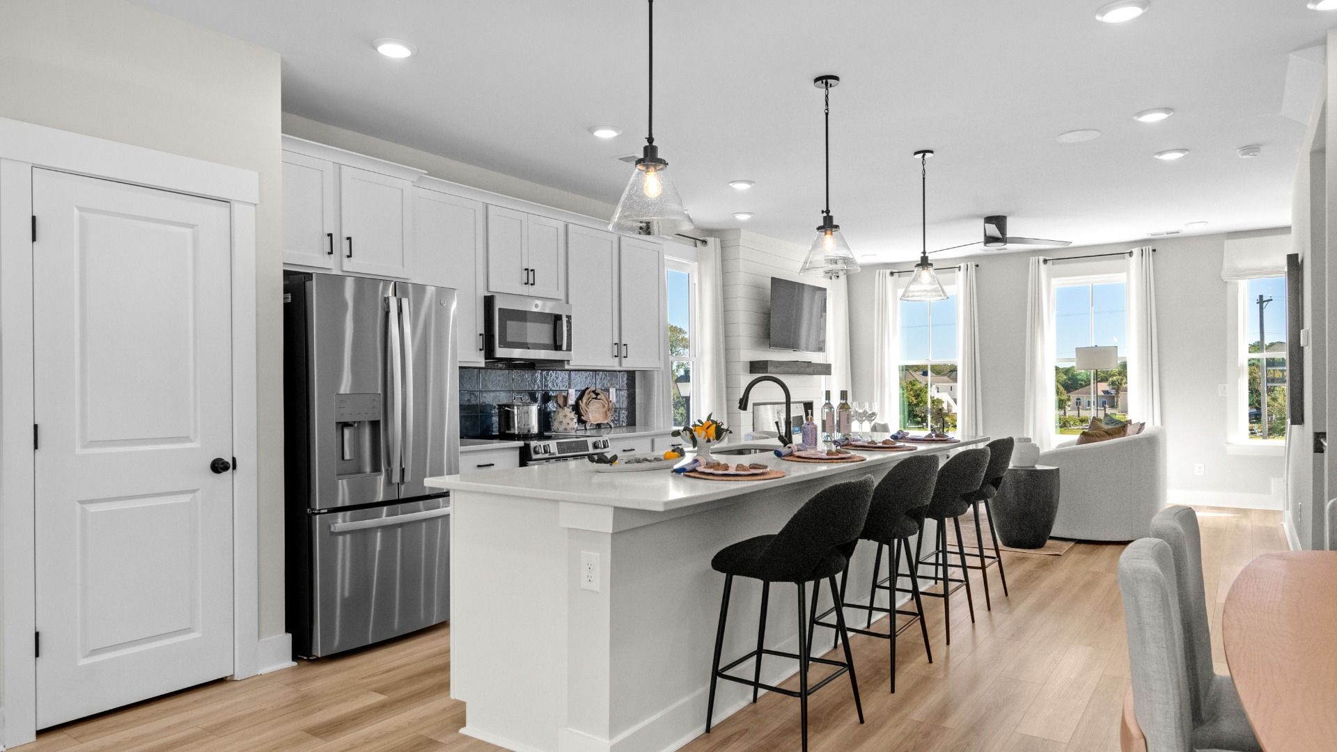 Brookgreen living room/kitchen:Bright, modern Brookgreen living area at Seabreeze, where comfort meets coastal charm.