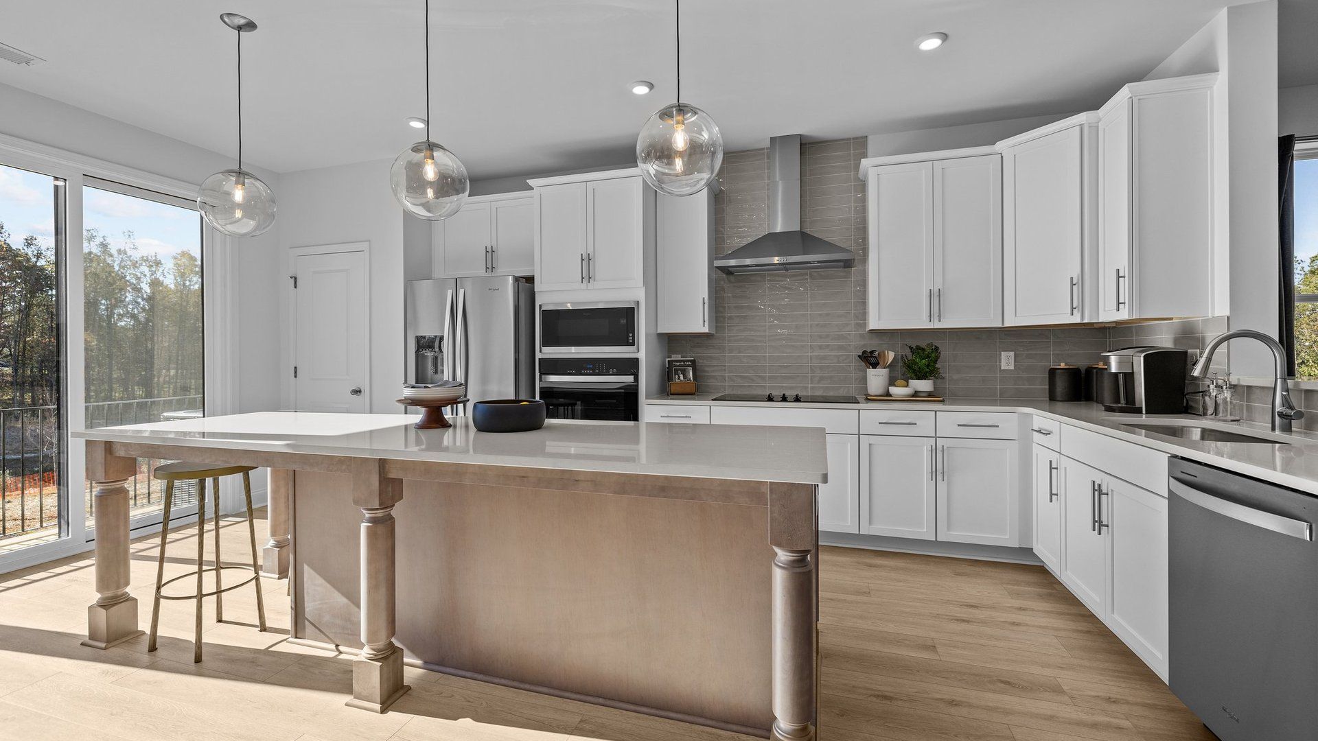 The Landon Kitchen with large island by DRB Homes in Charlotte, NC