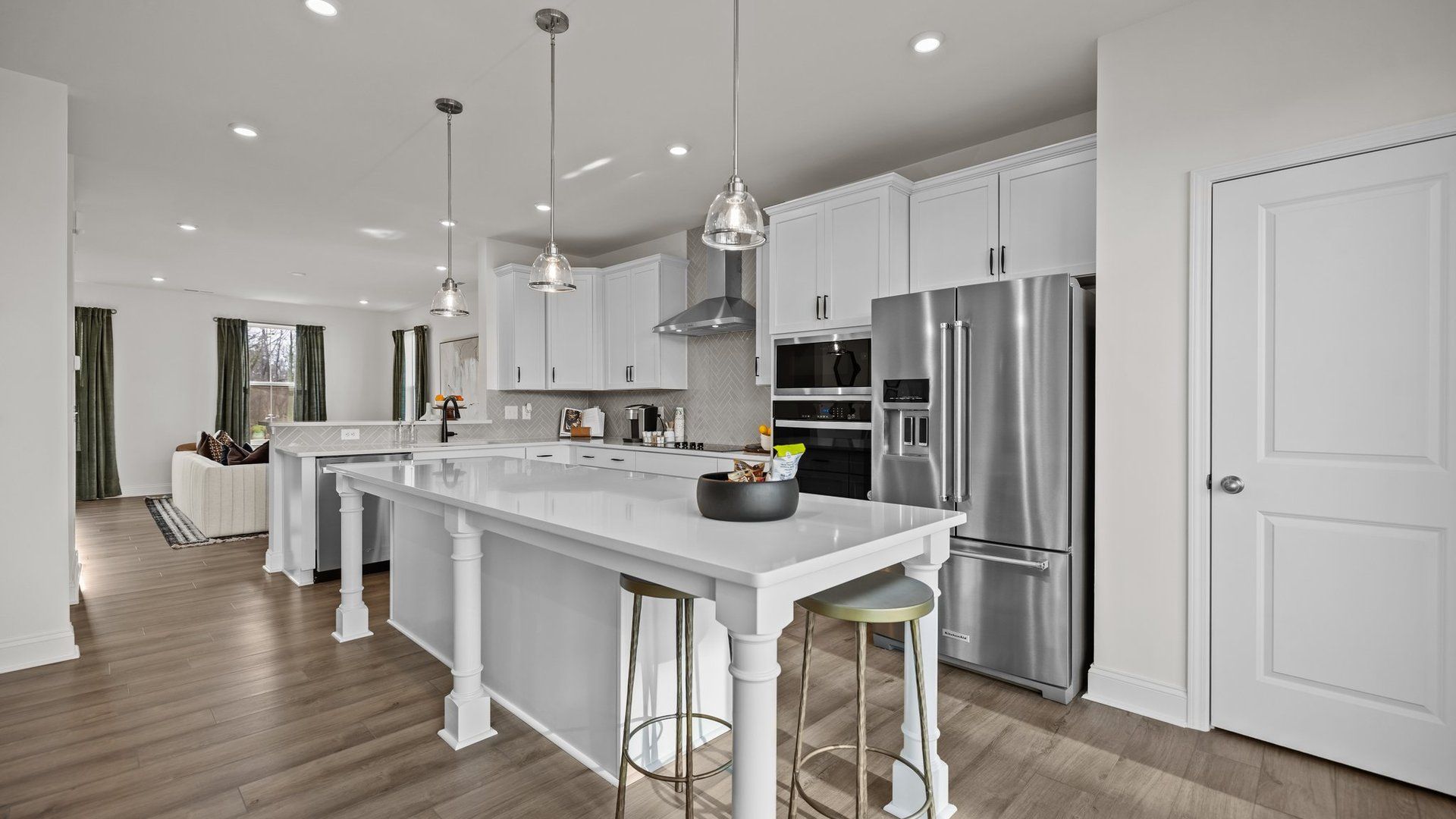The Landon Plan Gourmet Kitchen with Expanded Island by DRB Homes in Charlotte, NC