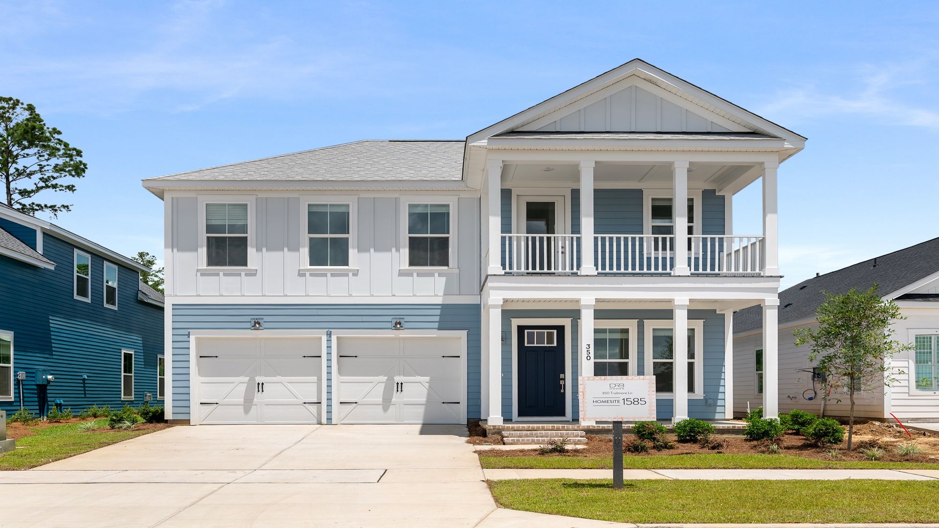 Exterior- Front:Tradd floor plan at 350 Trailmore Ln in Midtown at Nexton, Summerville SC with double porch and 2-car garage