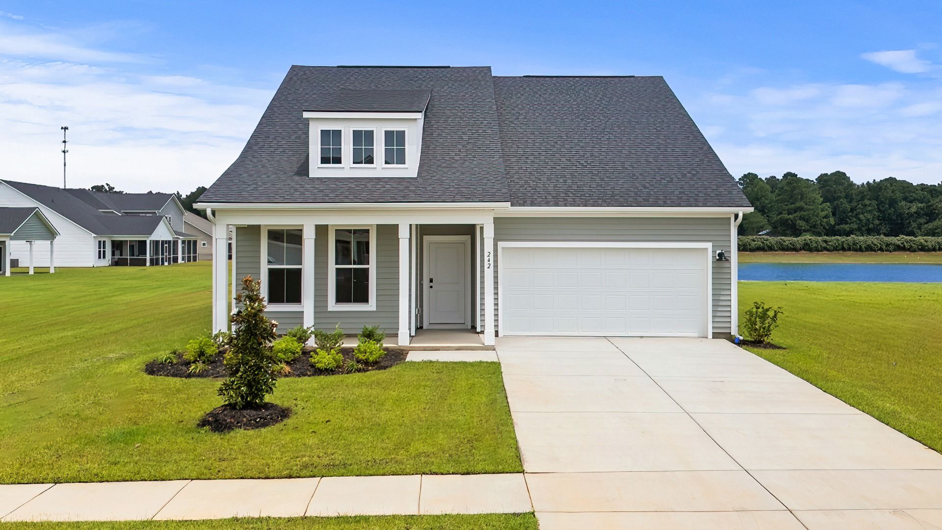 242 Letha Drive:Charming front exterior of 242 Letha Dr with covered porch in Chestnut Farms