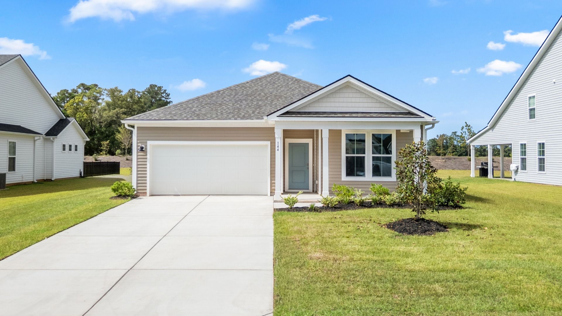 Elevation 3:Elevation 3 at 144 Joyce Drive showcases timeless curb appeal with Craftsman details and a welcoming front porch.