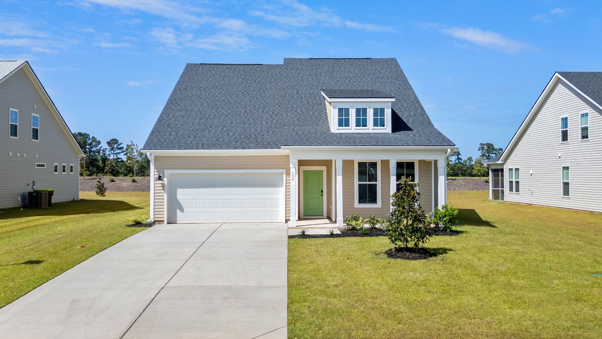 Chelsea- Elevation 4:Chelsea Elevation 4 at Chestnut Farms in Longs, SC with front porch and upper-level window detail