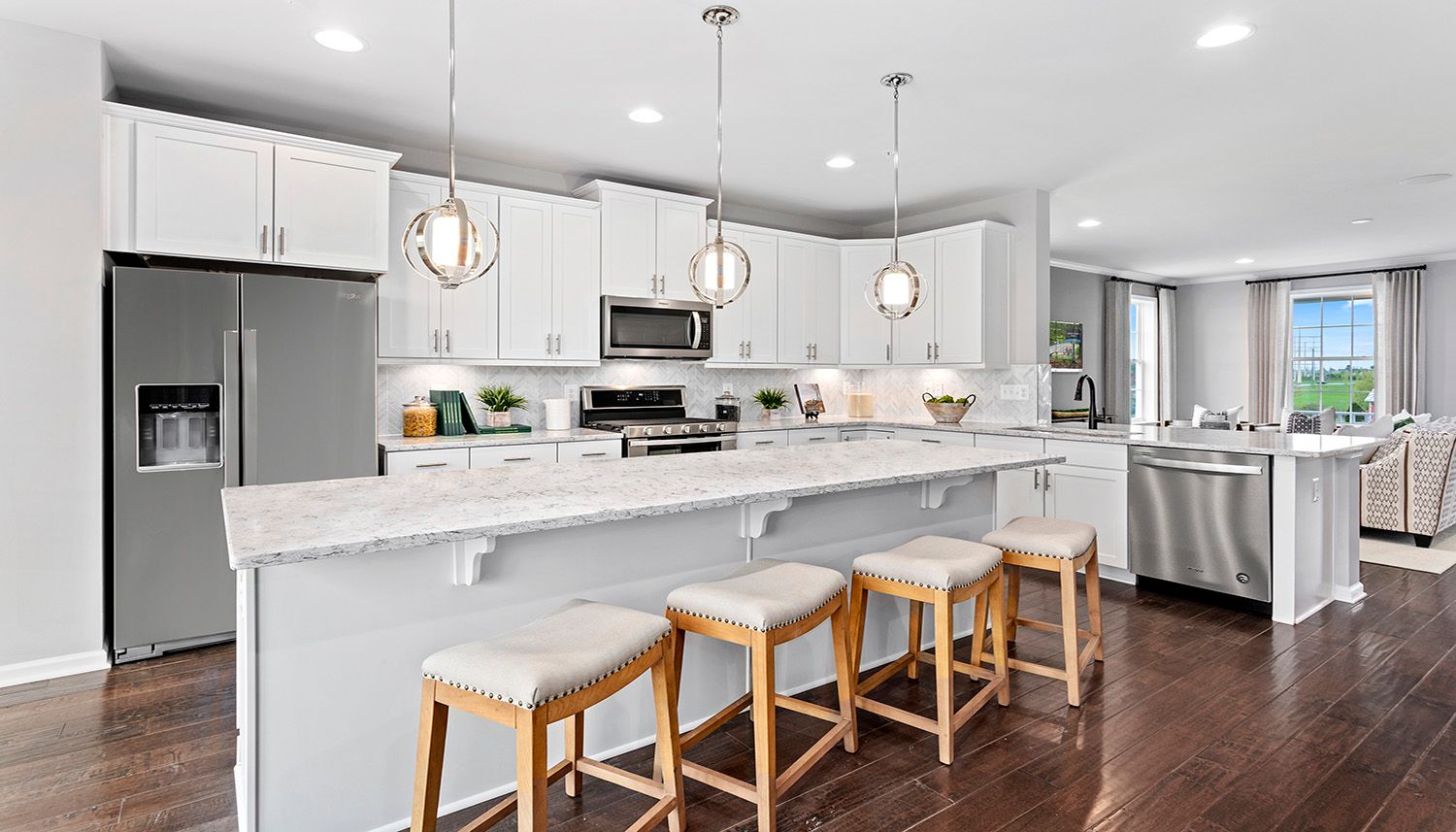 Oakton II Harrington Terrace Kitchen island with vinyl plank wood flooring Frederick, MD
