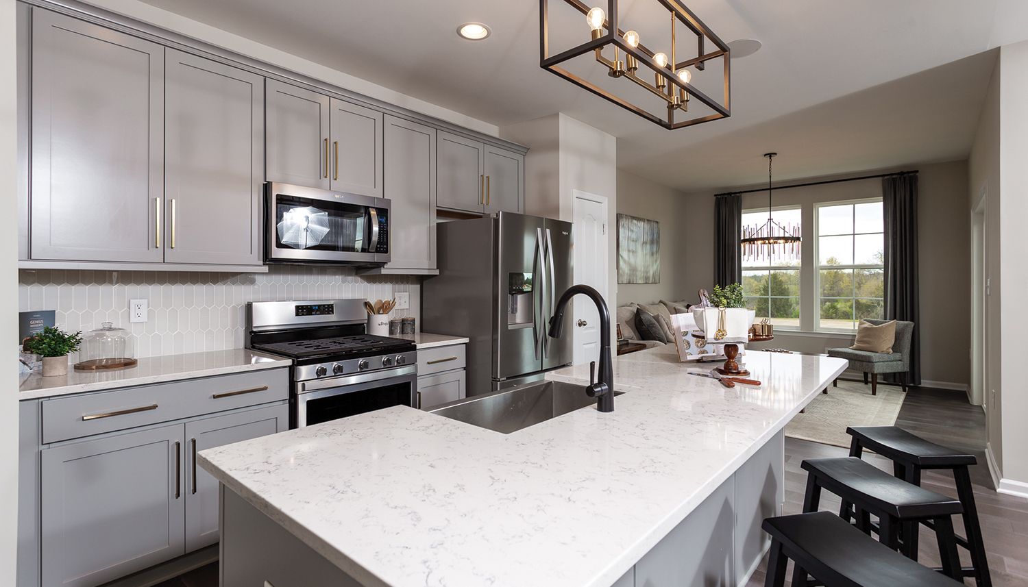 3-Story townhome in Charles Town, WV- open kitchen with large center island and light gray cabinets