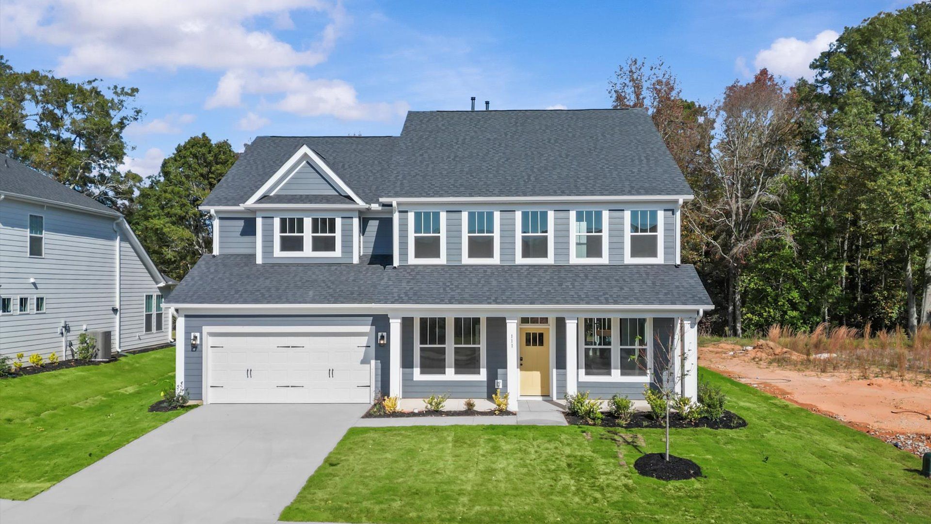 First-rate curb appeal with clean lines and a welcoming front entry:Exceptional home with tasteful exterior finishes and a thoughtfully designed façade