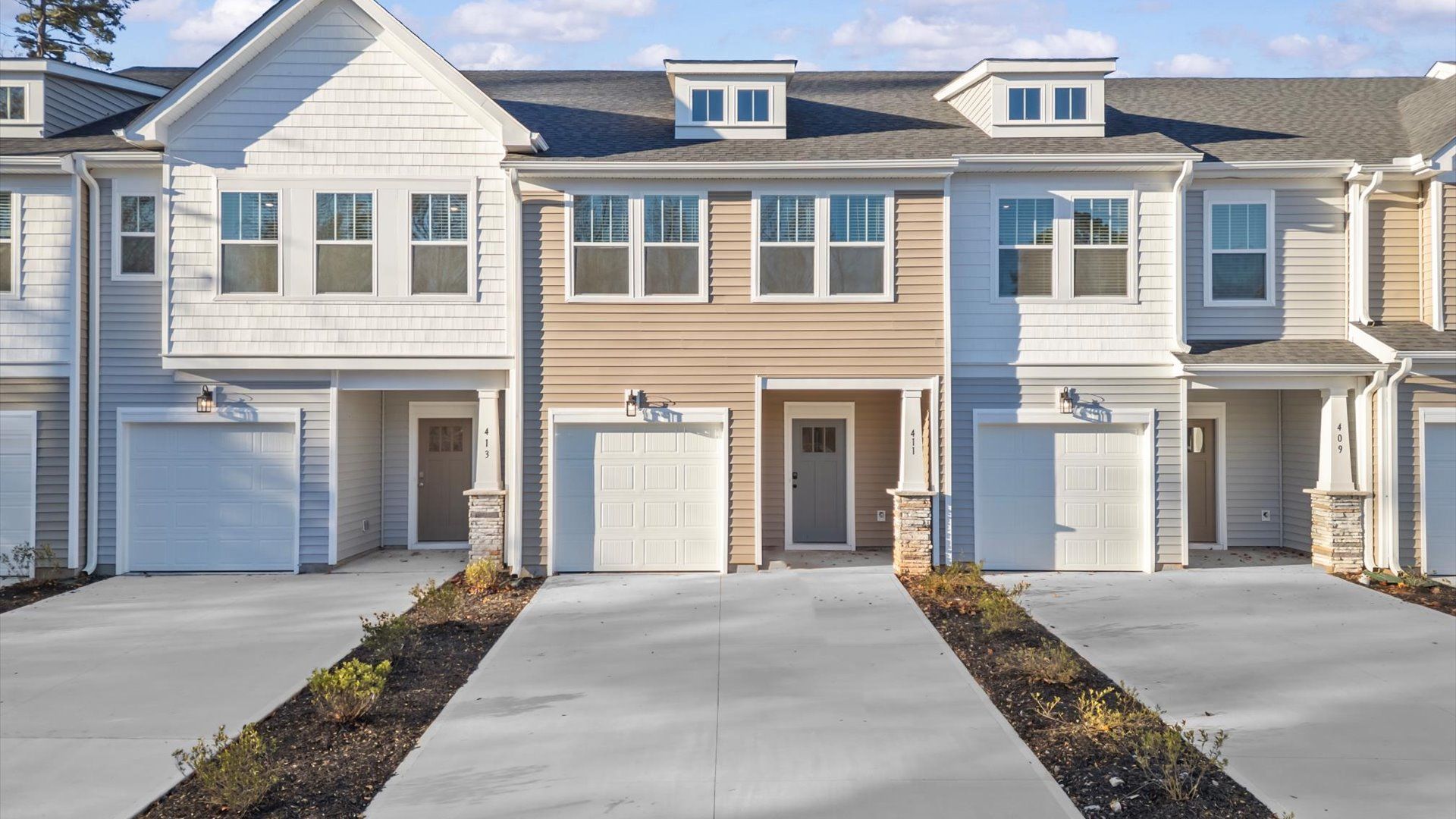 Notable street presence with tasteful elevation and thoughtful landscaping:Superior exterior design with modern details and established charm