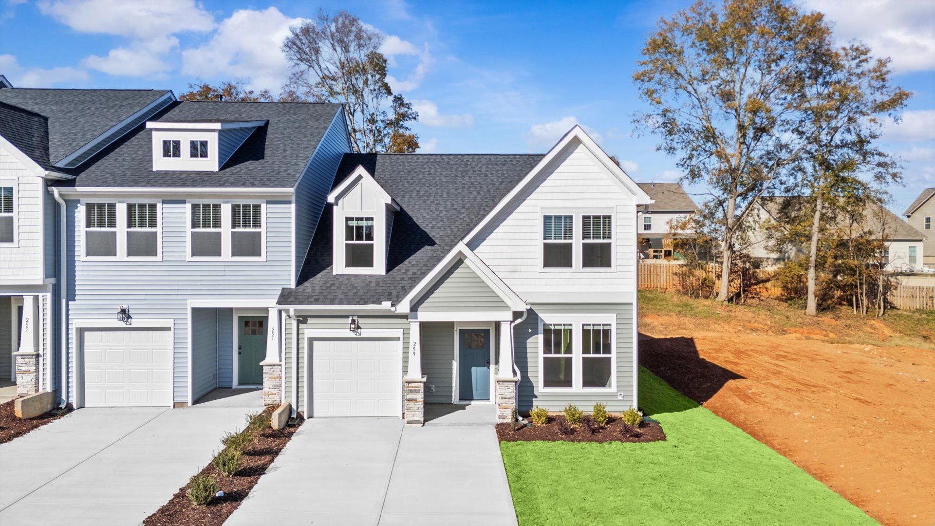 Functional design and eye-catching details in this accomplished townhome at Aspen Ridge:Notable curb appeal and elegant interiors in this reputable community