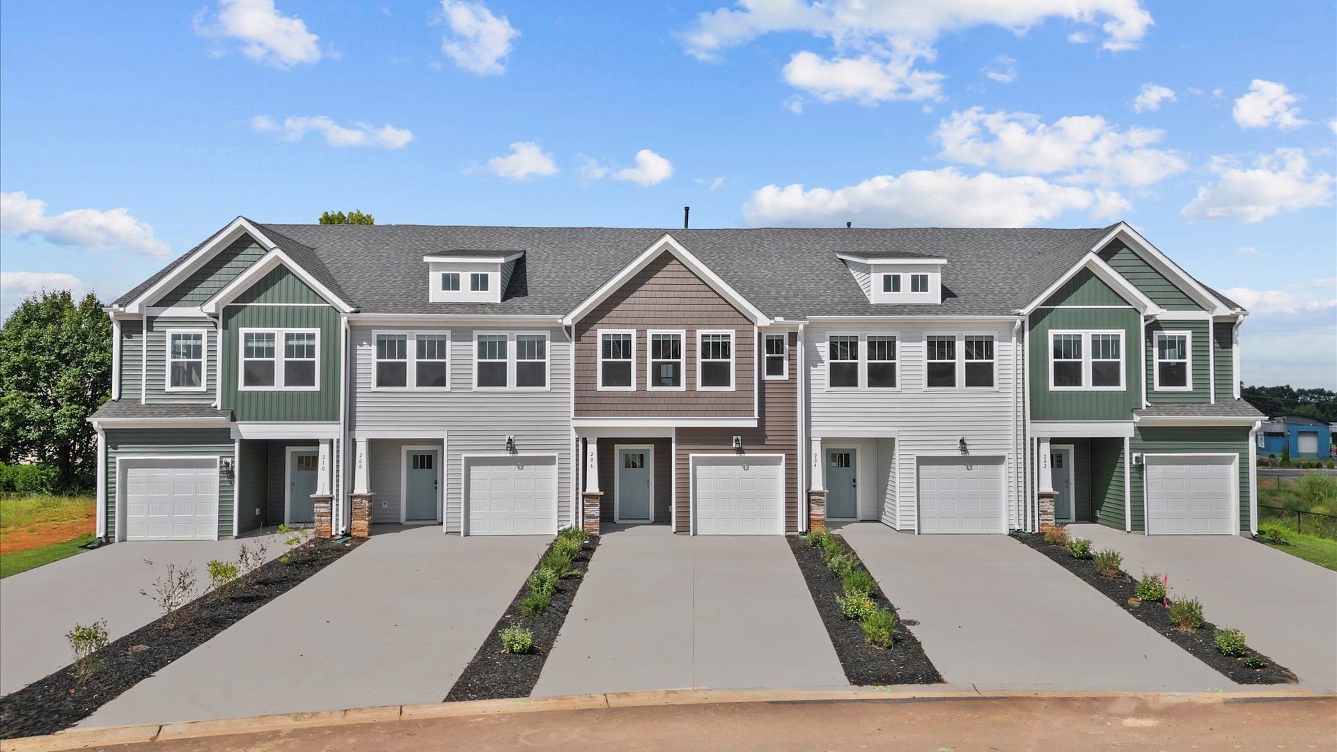 Exterior of two story townhome at Saluda Crossing by DRB Homes in Piedmont, SC