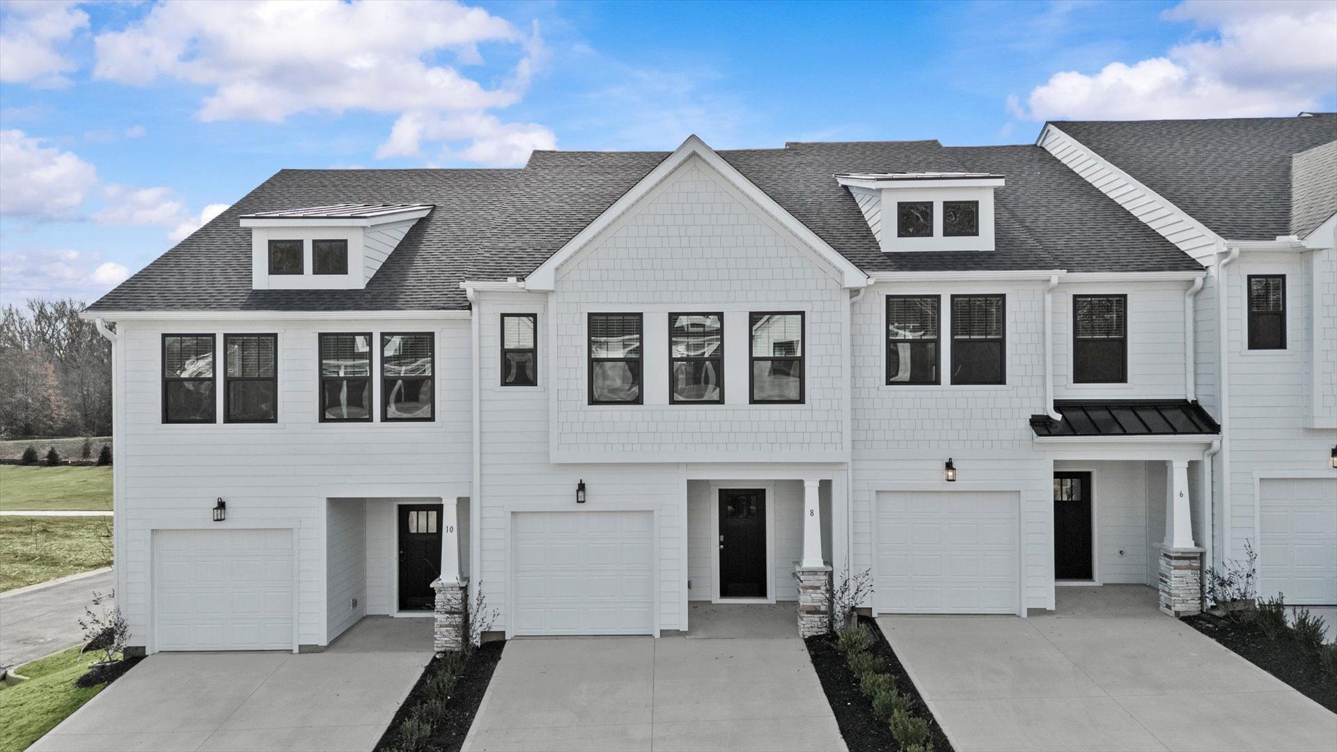 Exceptional home with tasteful exterior finishes and a thoughtfully designed façade:Elegant exterior with eye-catching curb appeal in a first-class DRB Homes community