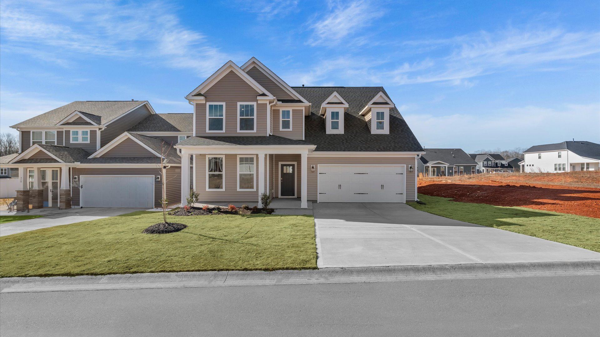 Notable street presence with tasteful elevation and thoughtful landscaping:Memorable first impression with elegant exterior design and exceptional materials