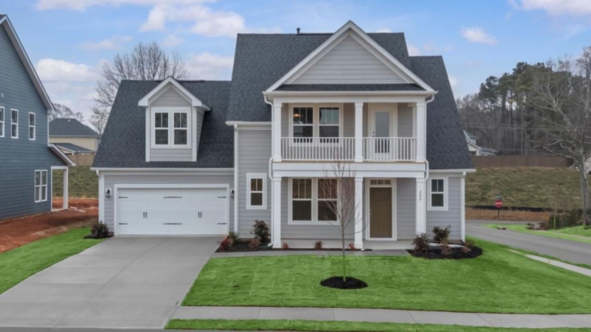 Notable street presence with tasteful elevation and thoughtful landscaping:First-rate curb appeal with clean lines and a welcoming front entry
