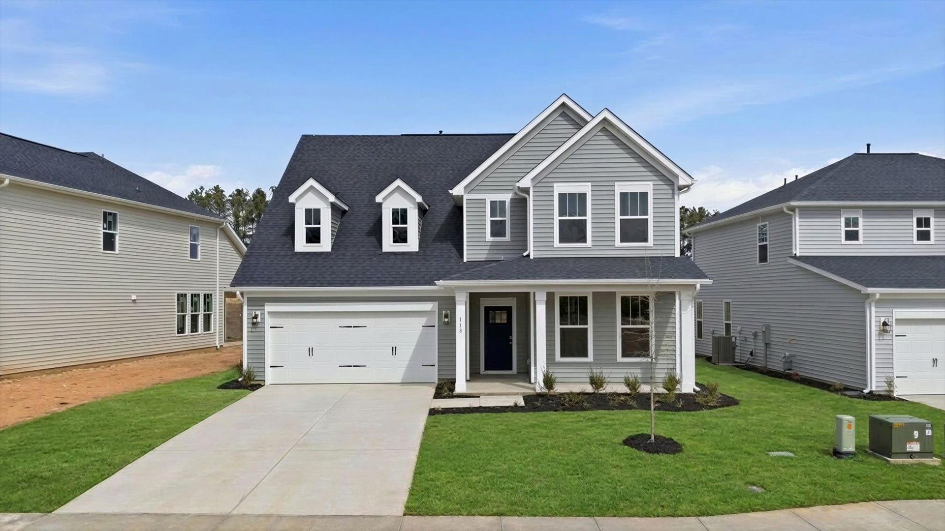 Superior exterior design with modern details and established charm:Exclusive DRB Homes exterior with balanced proportions and vibrant curb appeal at this single family home in Gray Court, SC