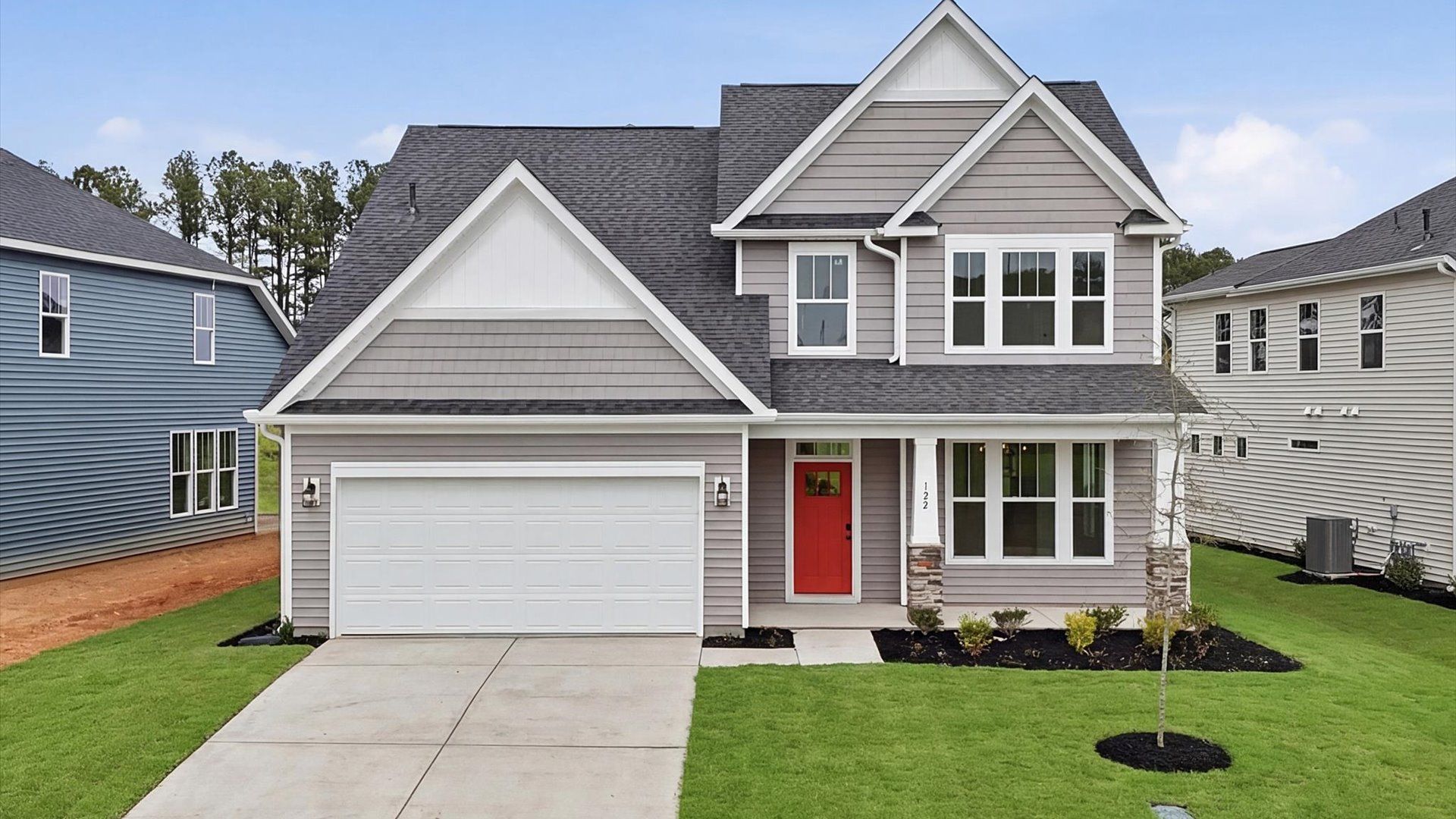 Polished exterior presence with superior detailing and refined color palette:Exclusive DRB Homes exterior with balanced proportions and vibrant curb appeal in Gray Court, SC