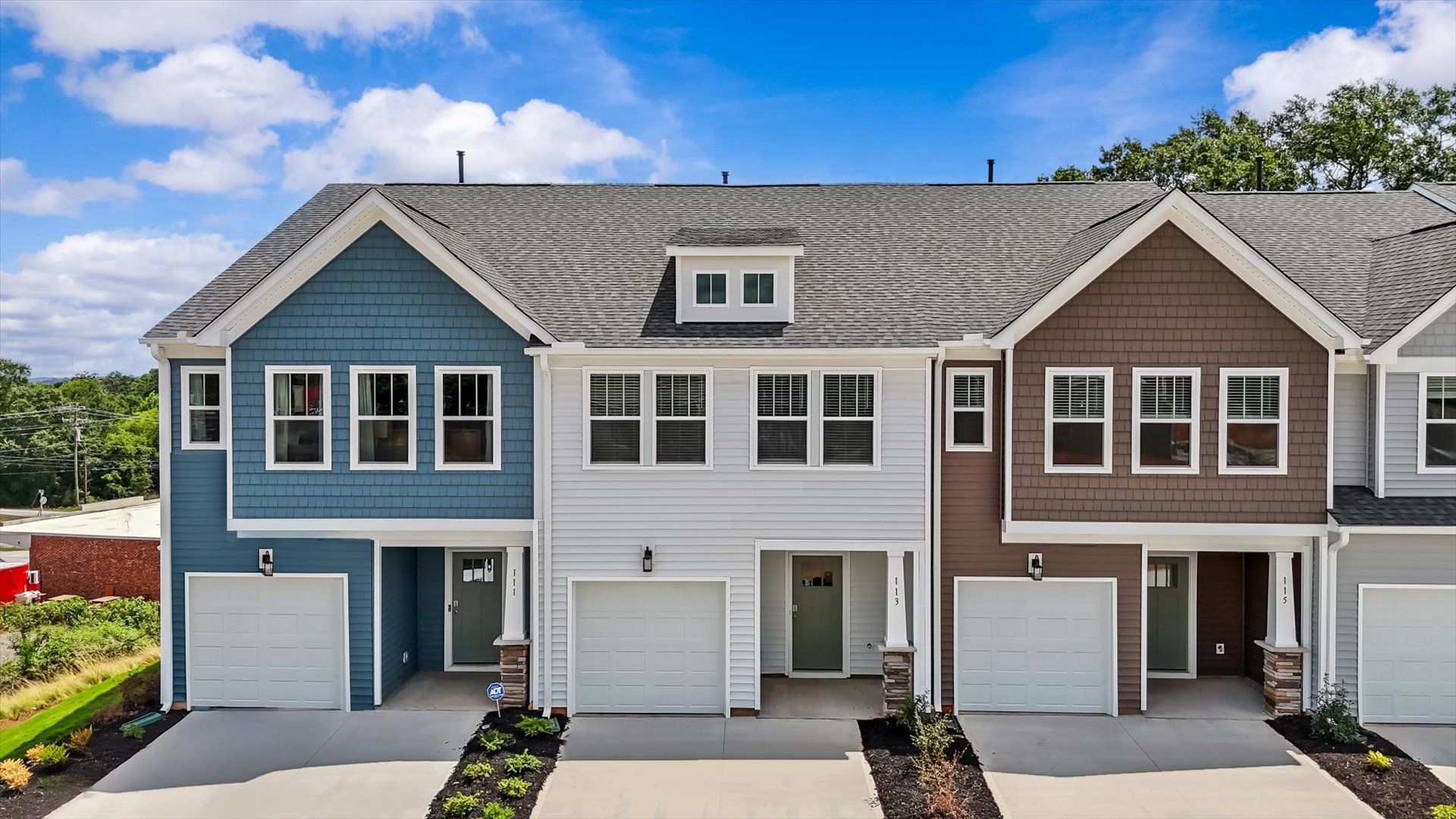 Exterior of two story townhome at Saluda Crossing by DRB Homes in Piedmont, SC