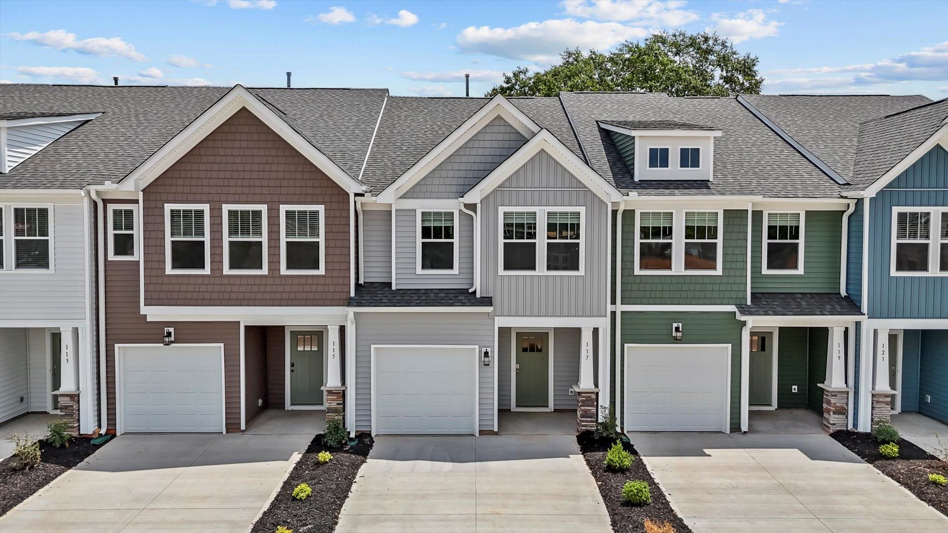 Highly skilled design meets functional luxury in this leading Saluda Crossing townhome:Elegant exterior with eye-catching curb appeal in a first-class DRB Homes community