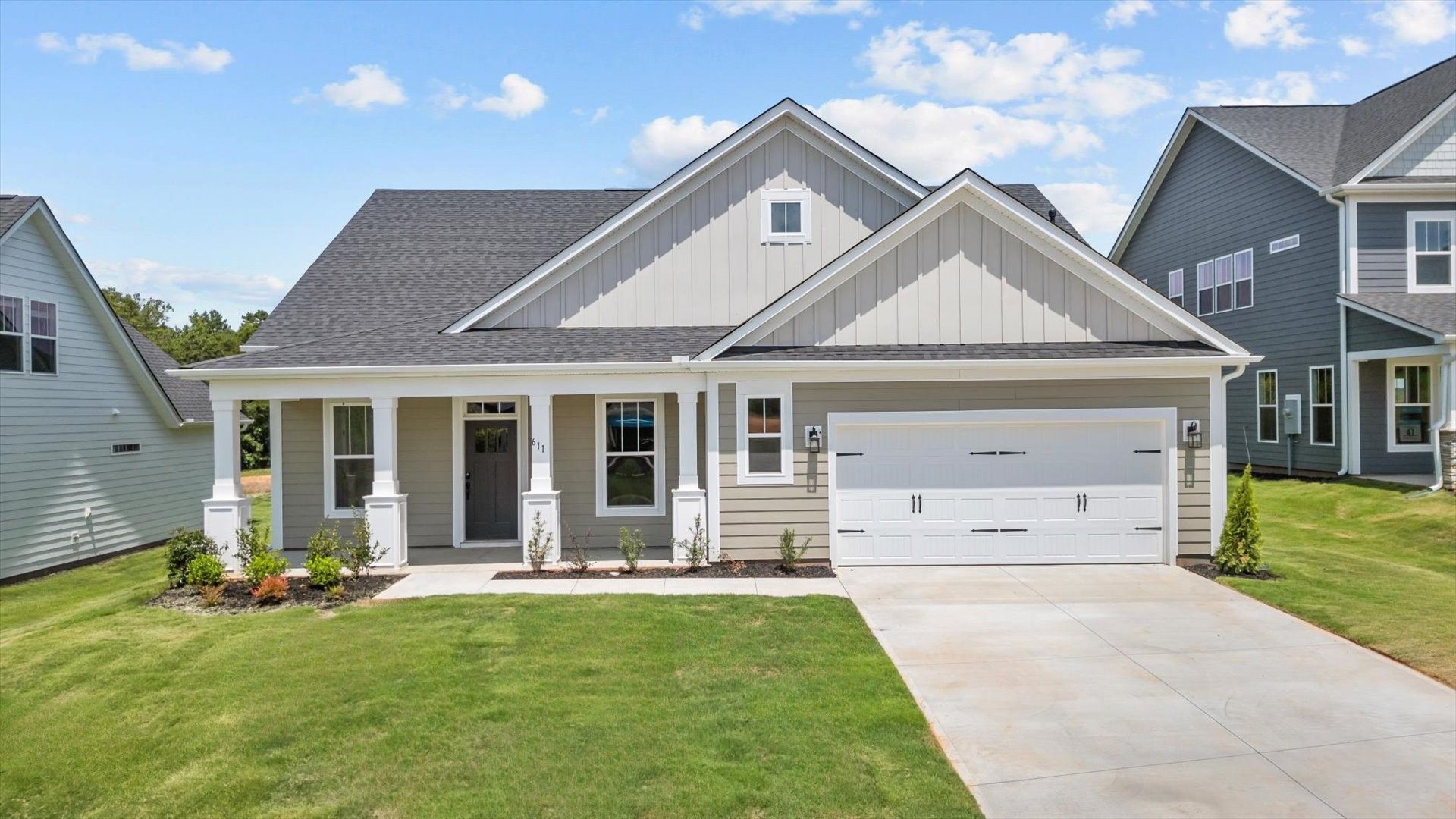 Elegant exterior with eye-catching curb appeal in a first-class DRB Homes community:First-rate curb appeal with clean lines and a welcoming front entry
