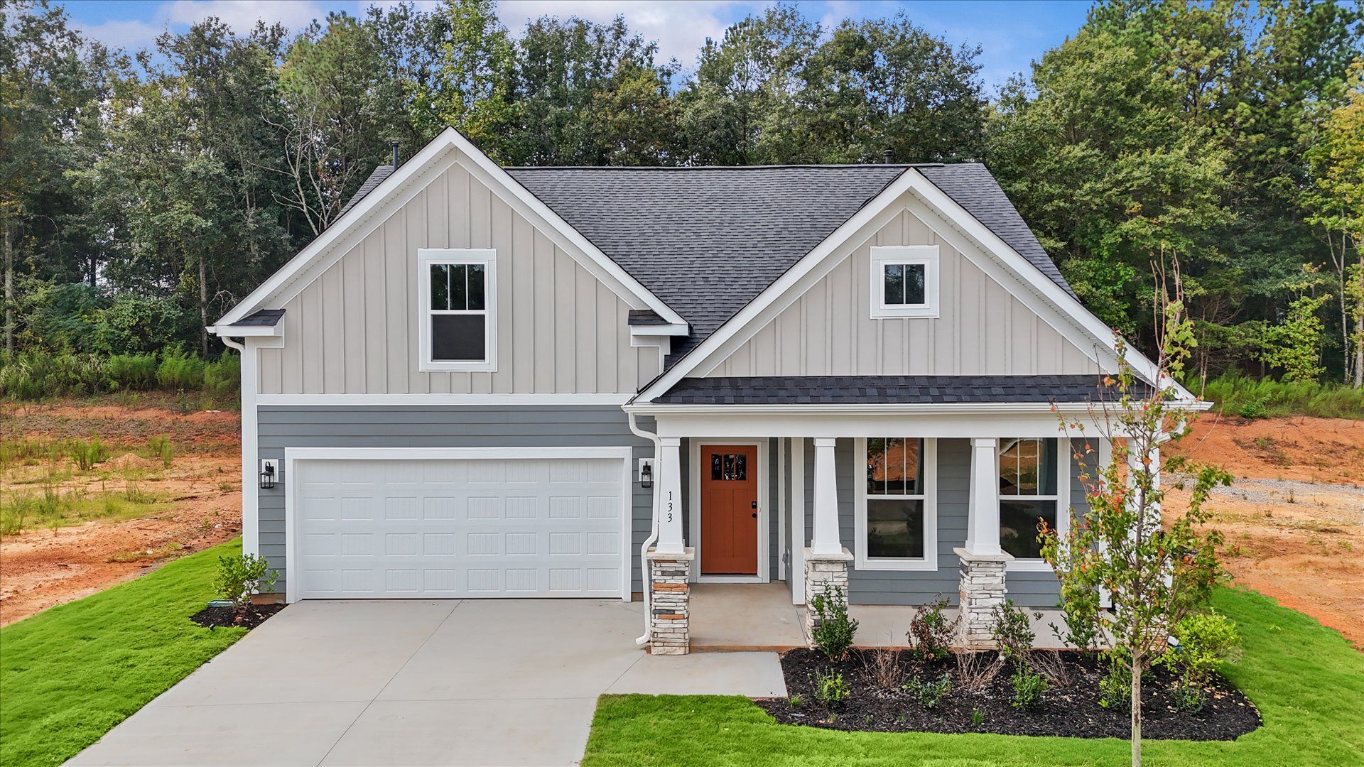 Elegant exterior with eye-catching curb appeal in a first-class DRB Homes community:Eye-catching exterior and tasteful interior upgrades in a prime location