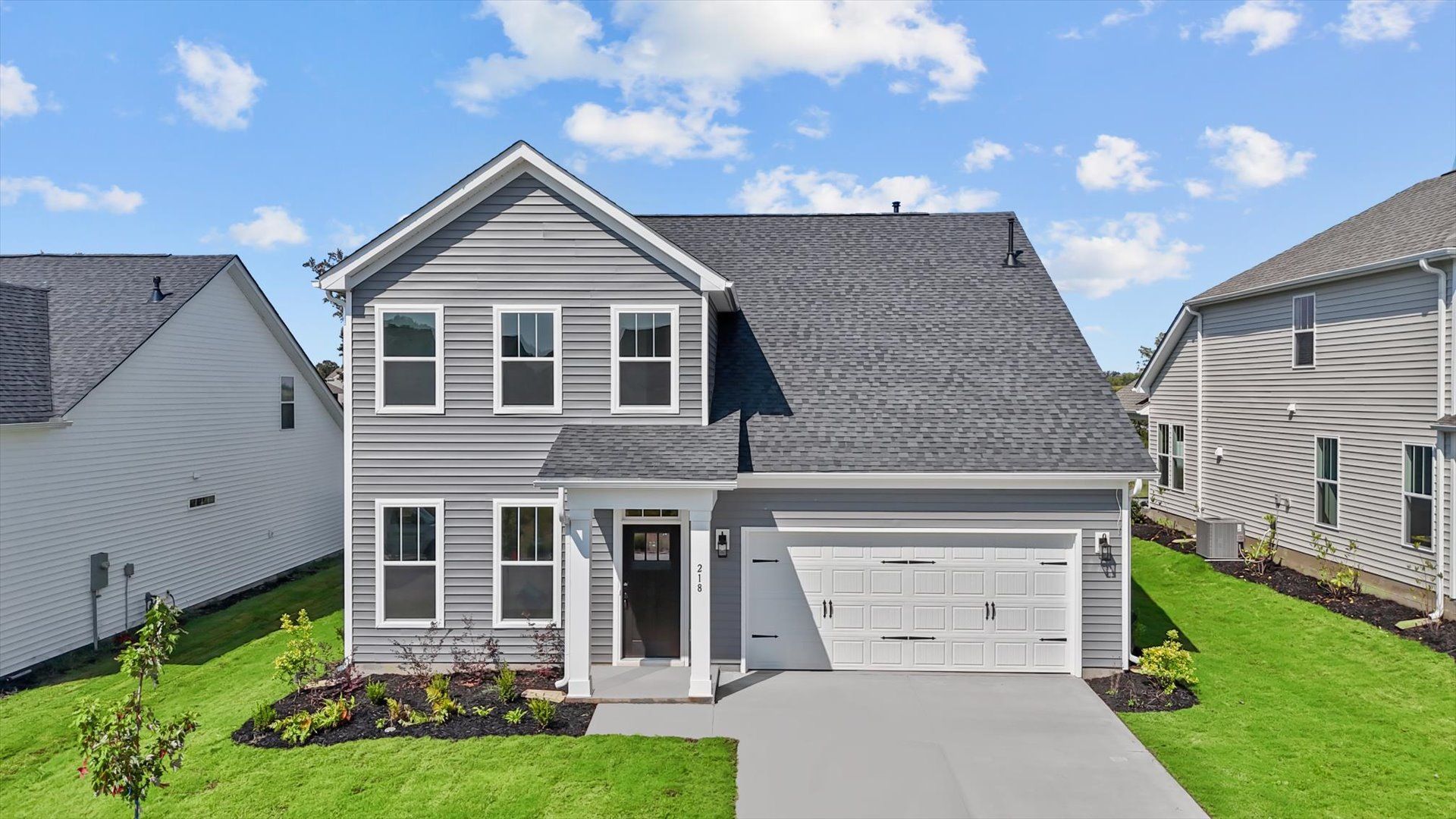 Superior exterior design with modern details and established charm:First-rate curb appeal with clean lines and a welcoming front entry