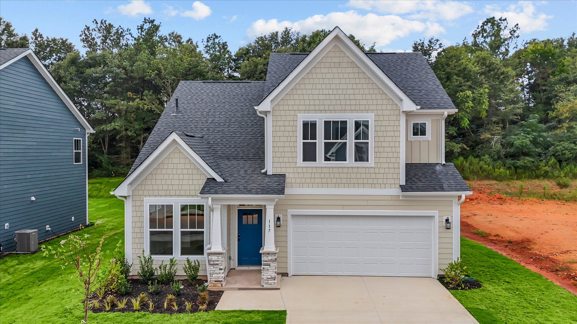 Elegant exterior with eye-catching curb appeal in a first-class DRB Homes community:First-rate curb appeal with clean lines and a welcoming front entry