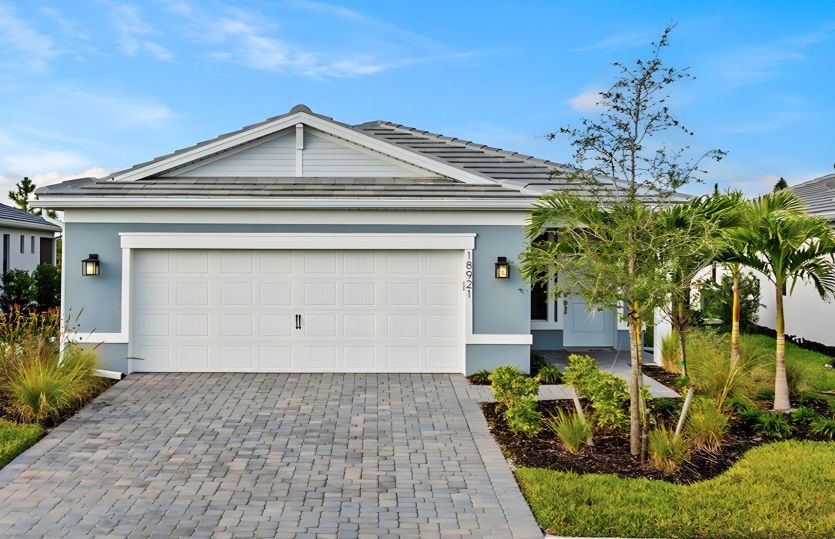 Exterior:Welcoming Hallmark Exterior with Impact Glass