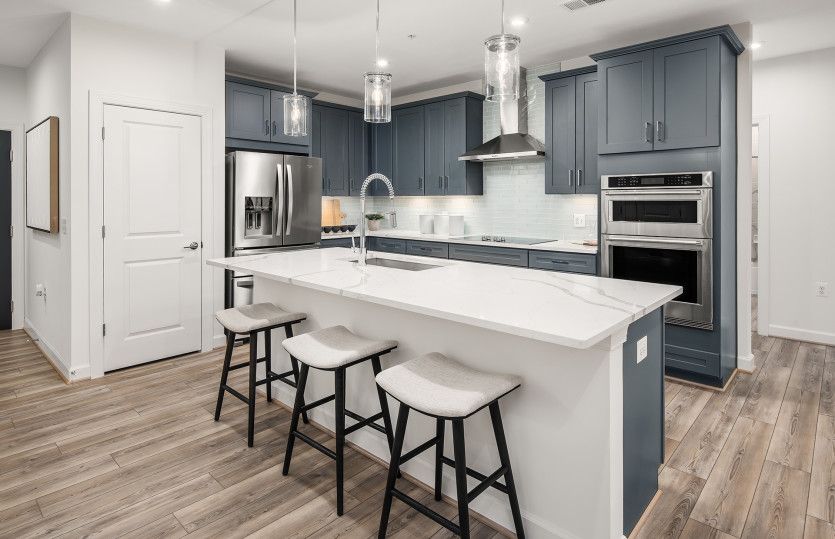 3.2.0 C - Cole:Seating at the Large Island in the Gourmet Kitchen