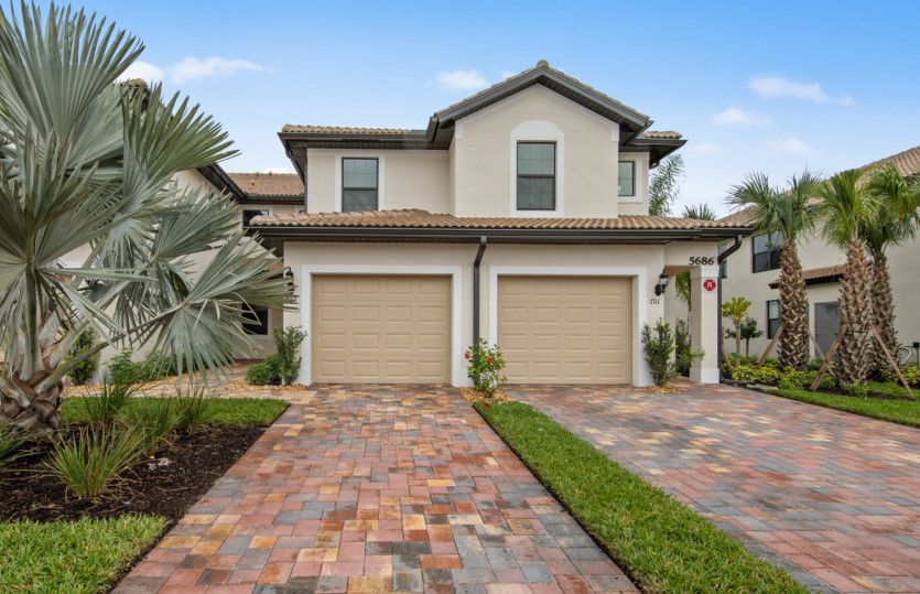 Egret:The Egret, a first floor carriage home shown with a Mediterranean inspired exterior