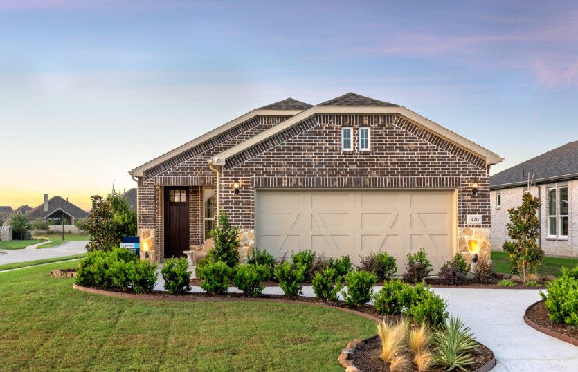 Exterior:The Compass, a one-story home with 2-car garage *actual home