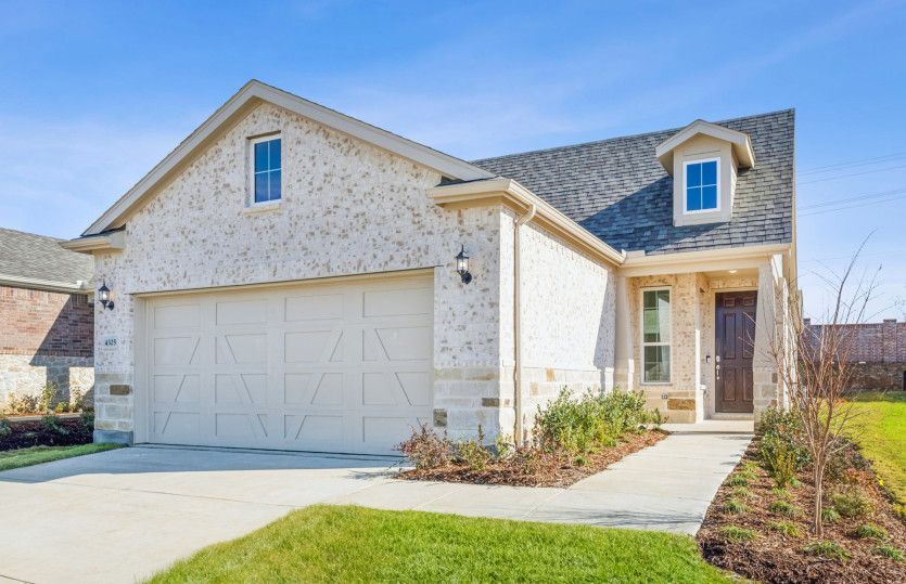 Exterior:The Compass, a one-story home with 2-car garage, shown with Home Exterior LS204