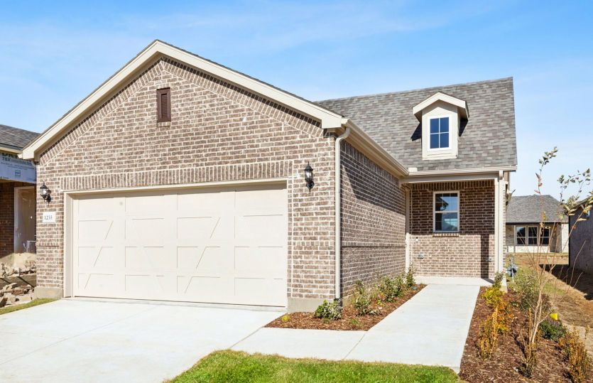 Exterior:The Alpine, a one-story home with 2-car garage, shown with home exterior LS203